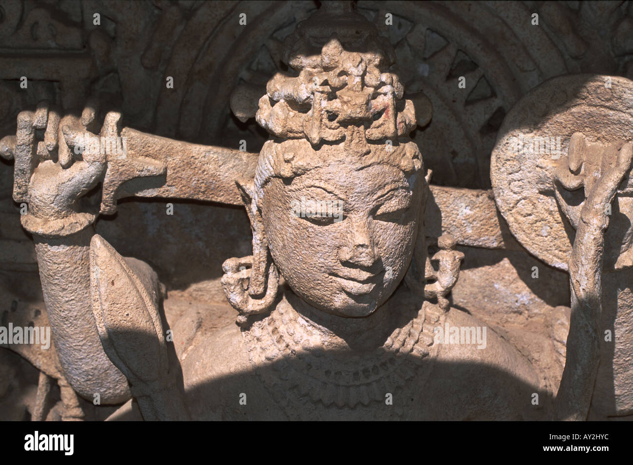 Carved stone figure with sword, Patan step well called the Rani ki vav, Gujarat, India. Built about 1050 A.D. Stock Photo