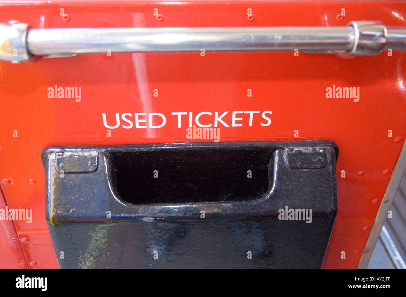 Used ticket box on old style London bus Stock Photo