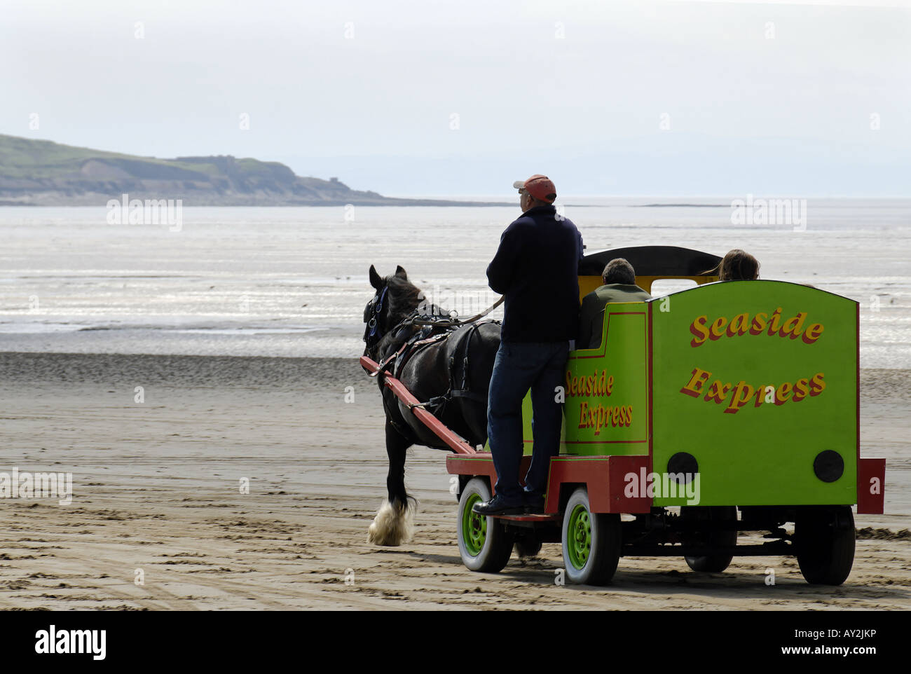 Horse drawn carriage on Weston Beach Stock Photo - Alamy