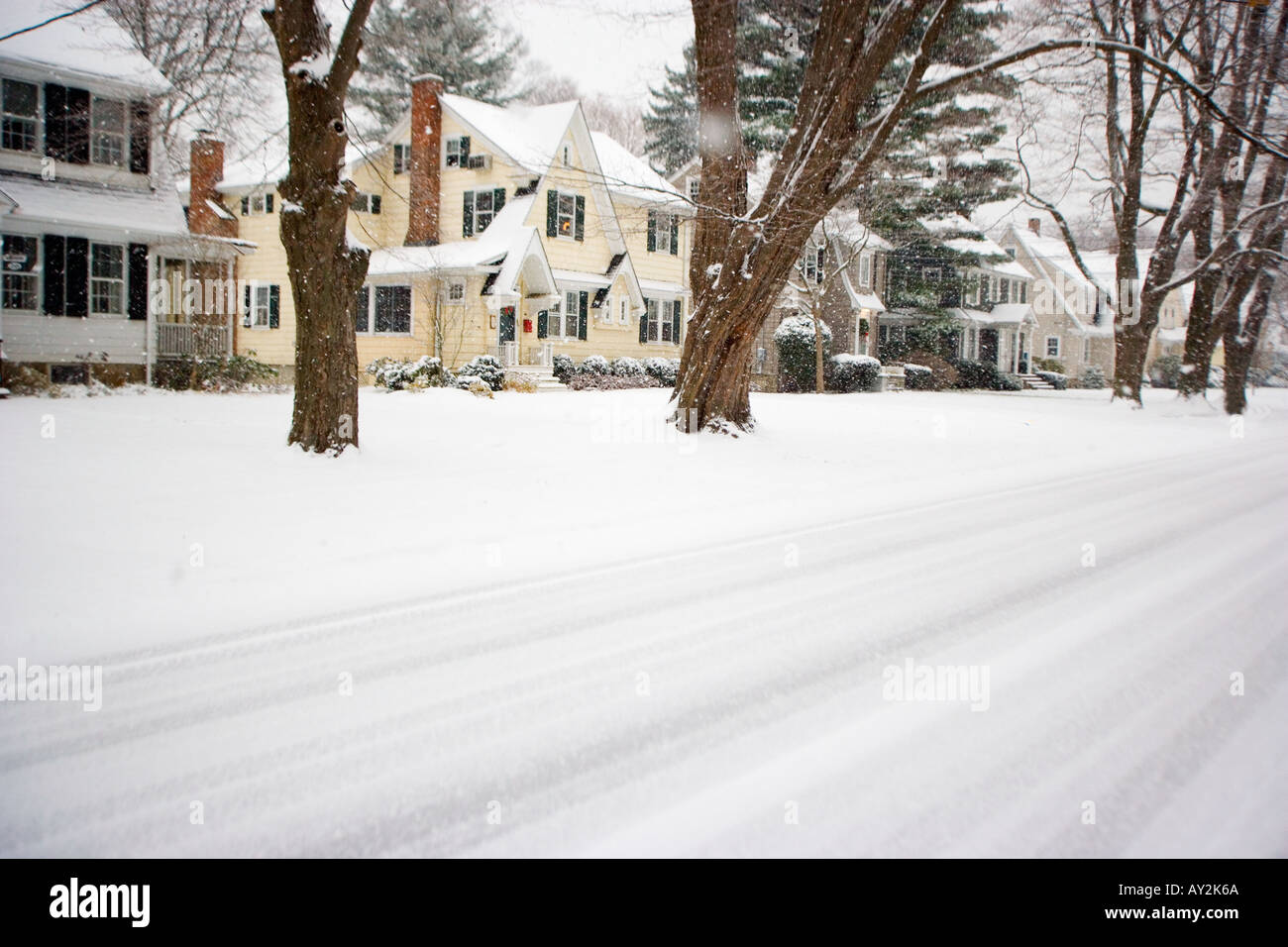 Residential street in a New England snowstorm Stock Photo - Alamy