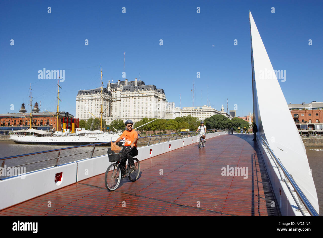 Cyclists on Bridge Puente de la Mujer Peatonal Puerto Madero Buenos Aires Argentina South America Stock Photo