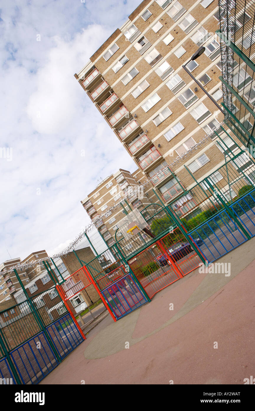 Playground on a council estate with high rise buildings Stock Photo