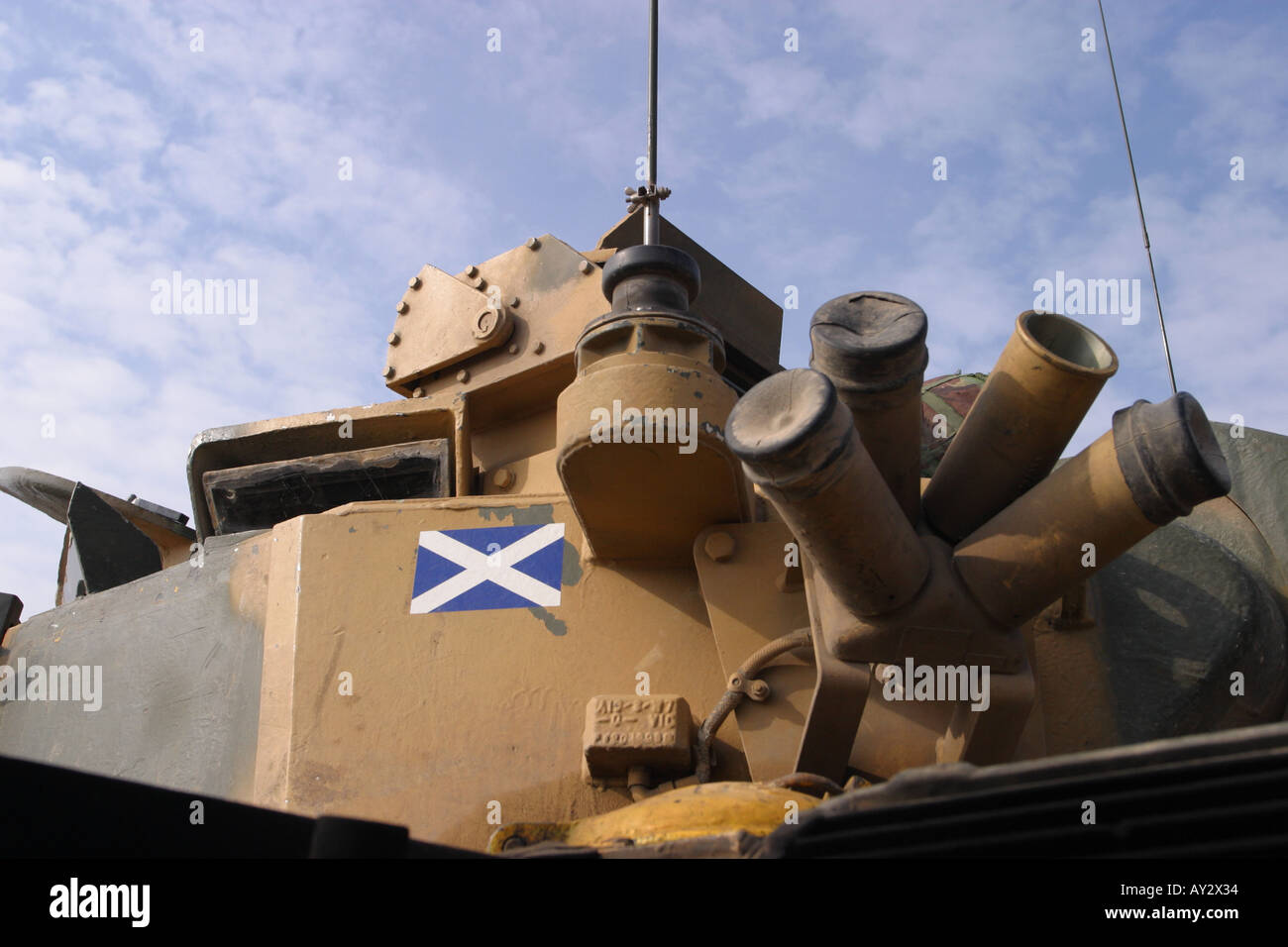 Smoke dispensers on British Army Warrior armoured fighting vehicle with Scottish Satire flag Stock Photo