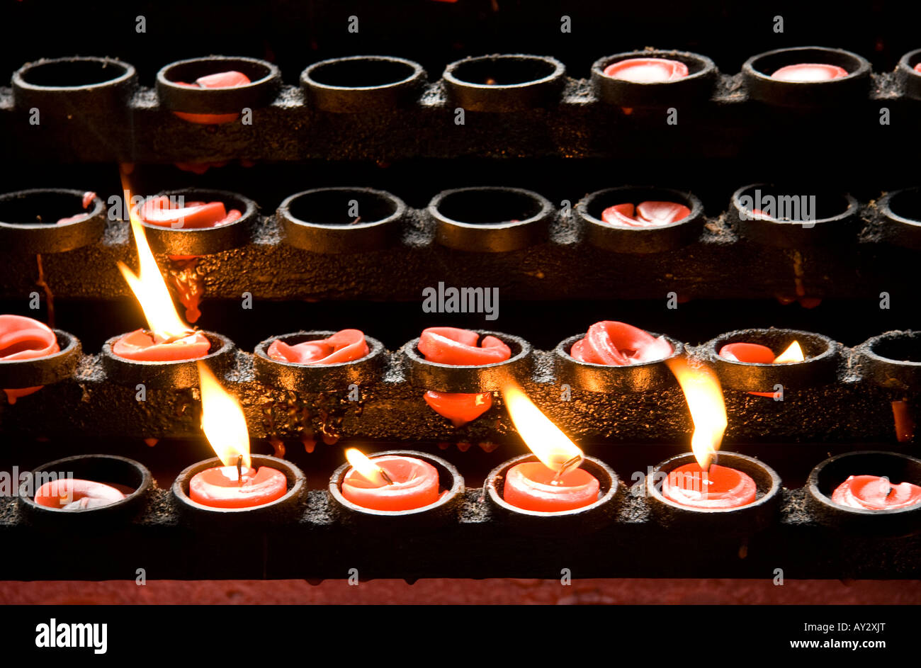 Lighted candles at a church in the Philippines Stock Photo Alamy