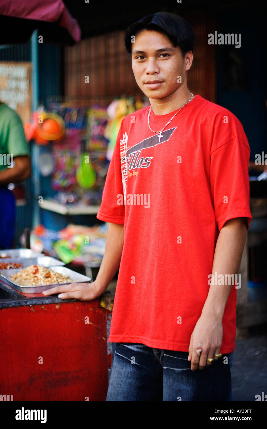 A peanut vendor in a market in Malate, Manila, Philippines Stock Photo