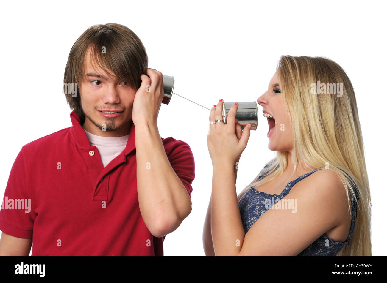 Young couple using tin phone can Stock Photo