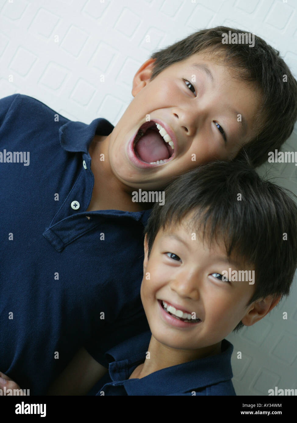 Portrait of two boys smiling Stock Photo - Alamy