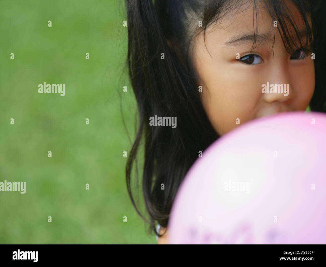 Portrait of a girl with a balloon Stock Photo - Alamy