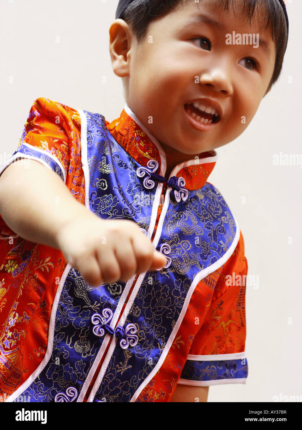 Close-up of a boy wearing traditional clothing Stock Photo - Alamy