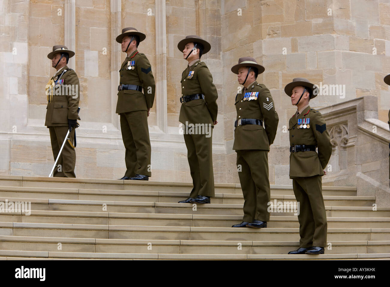 Gurkha's from the Royal Gurkha Rifles forming an honour guard on the steps of St George s Chapel in Windsor Castle, Windsor Stock Photo