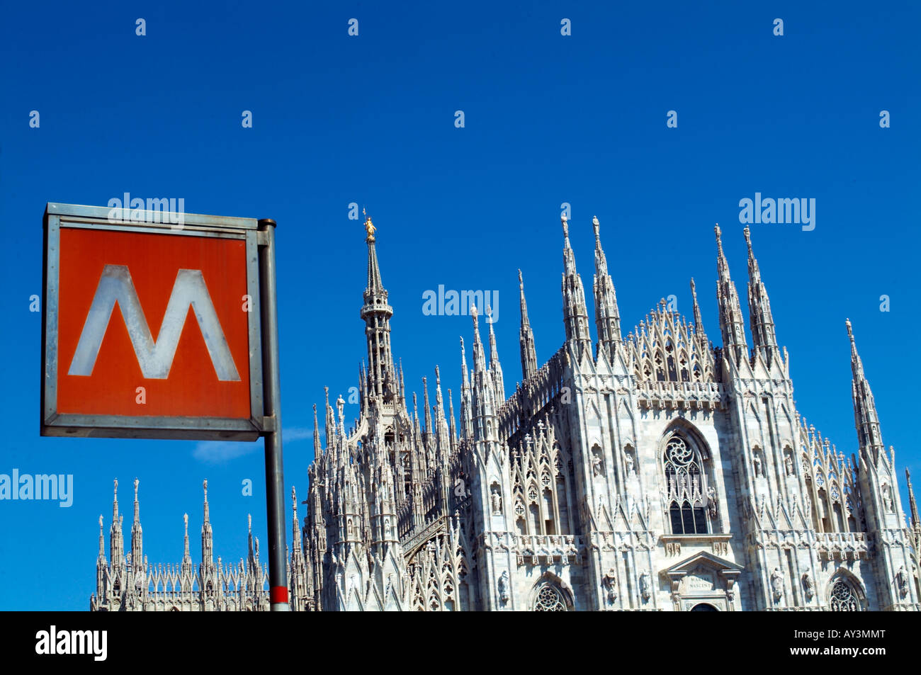 Milano Sign Milan cathedral, Duomo di Milano, marble gothic facade with metro sign ...