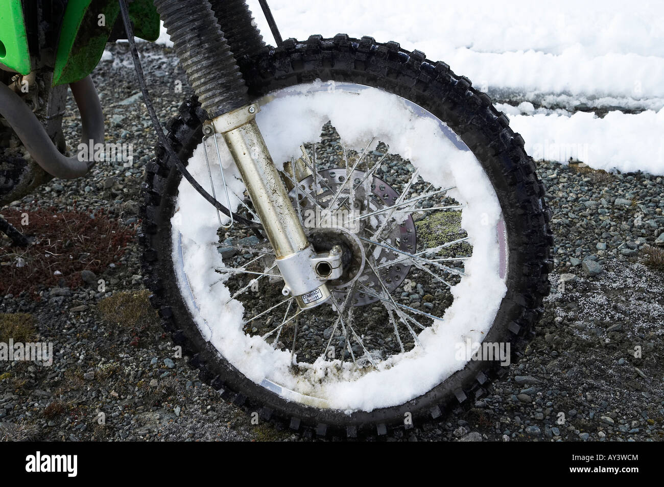 Snow on Trail Bike Wheel, Unusually Cold Weather, New Years Eve mid