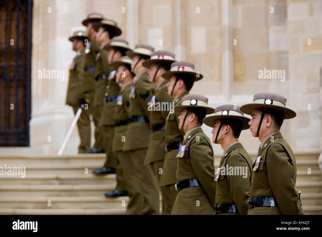 Gurkha's from the Royal Gurkha Rifles forming an honour guard on the steps of St George s Chapel in Windsor Castle, Windsor Stock Photo