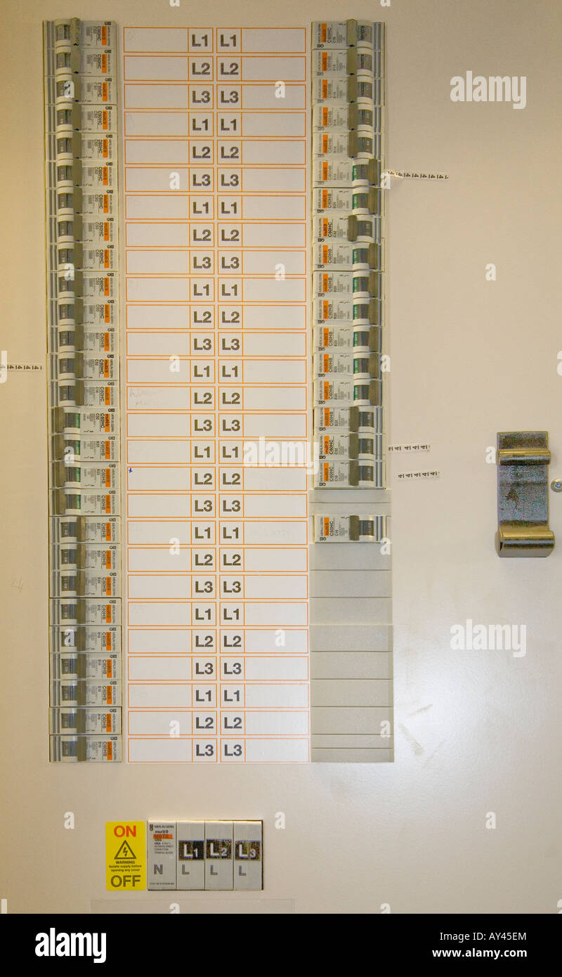 Electrical circuit breakers showing wiring and labels Stock Photo Alamy