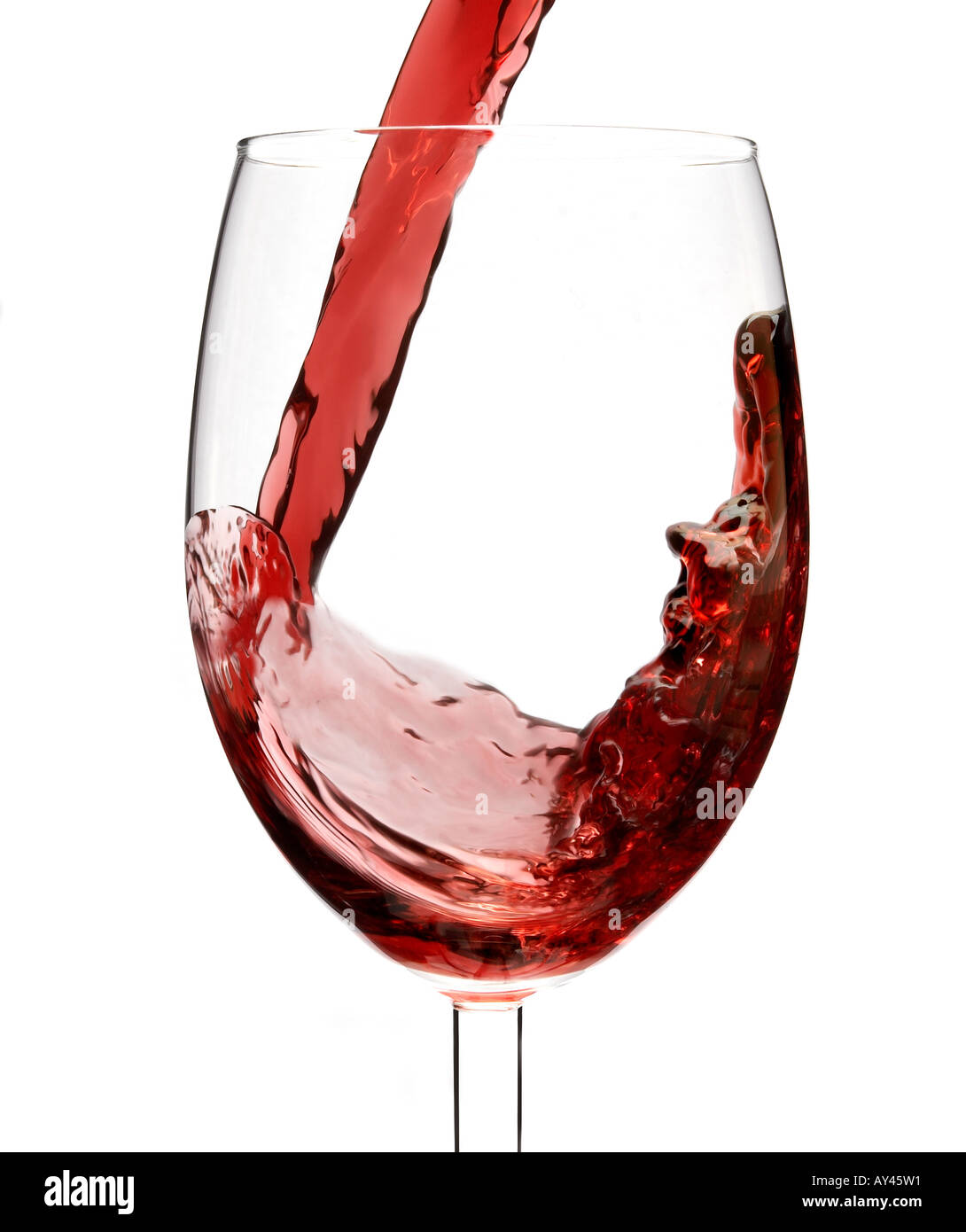 Red wine pouring into a glass Stock Photo Alamy