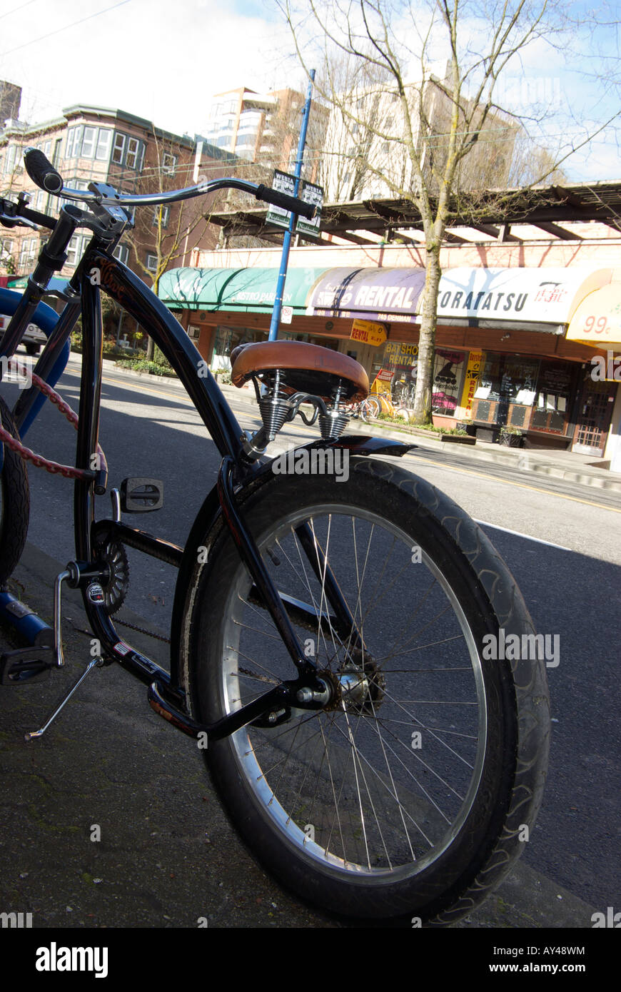 Rental bicycle and view to shops in the West End of Vancouver British