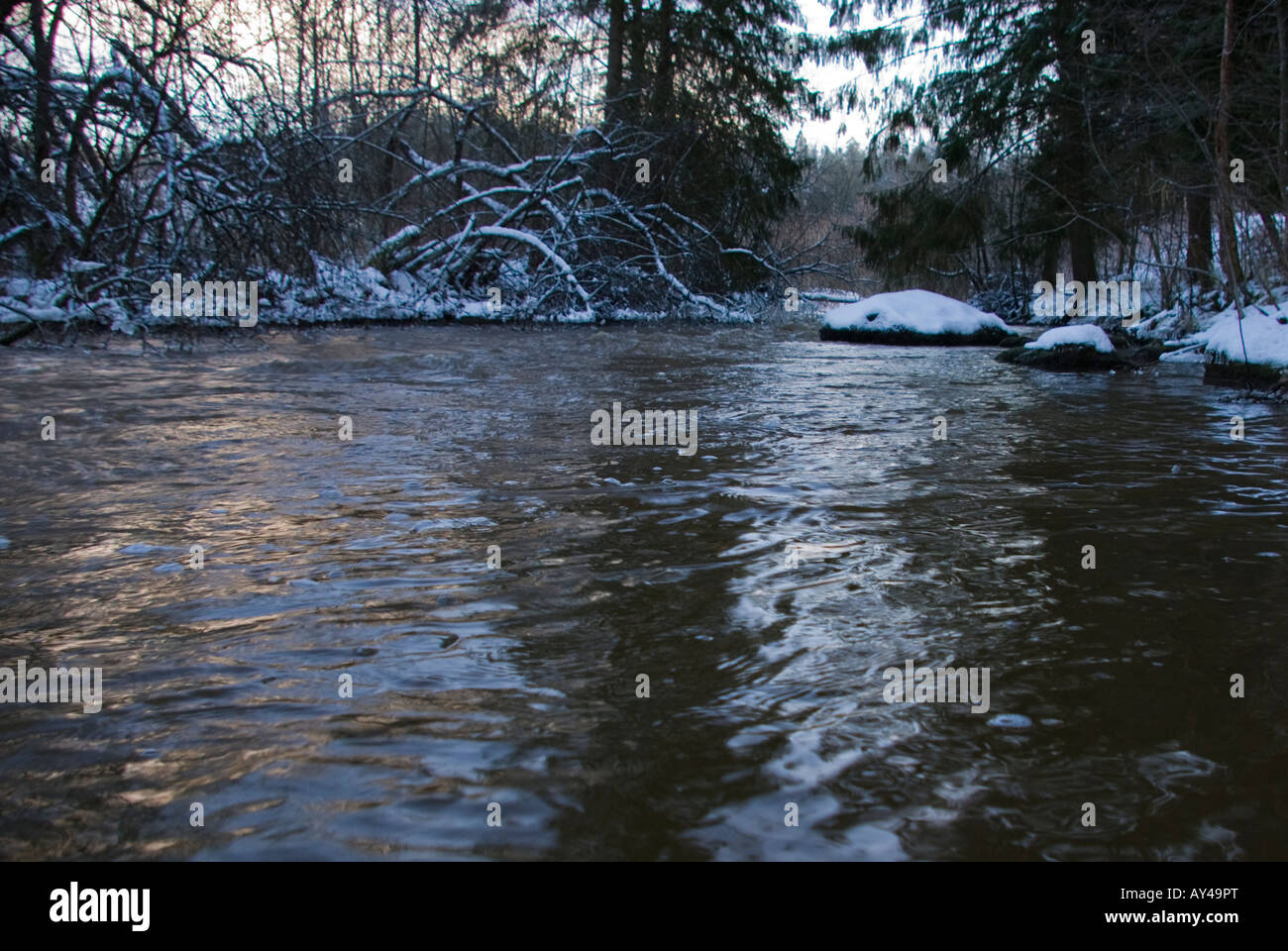 A dark river on a winter day Stock Photo