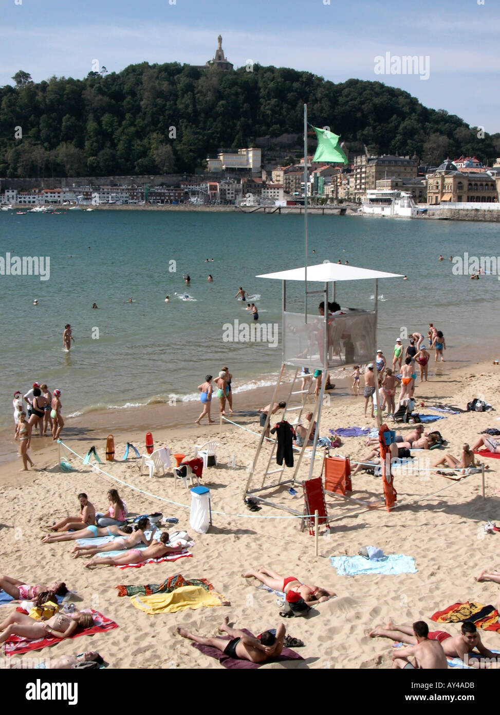 Lifeguards and bathers Playa de la Concha San Sebastian Basque region of Spain Stock Photo