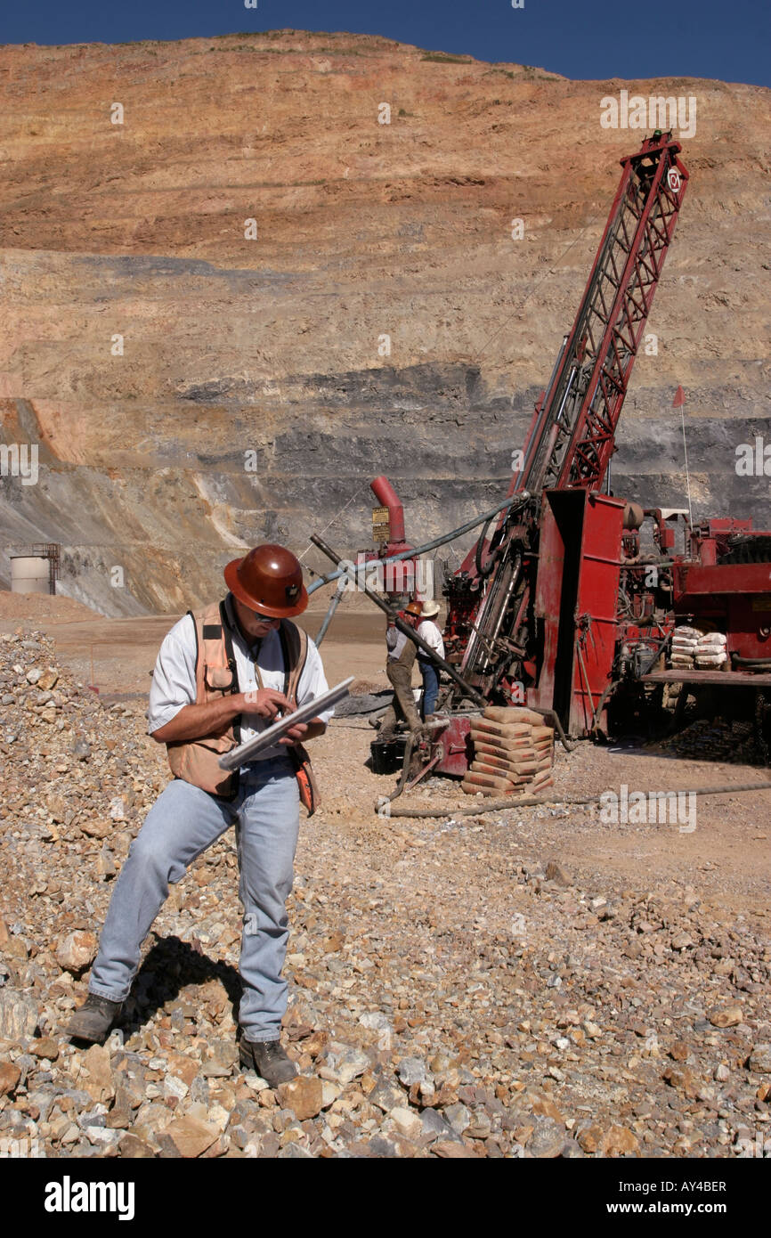 Geologist on site while exploration drilling to extend high grade