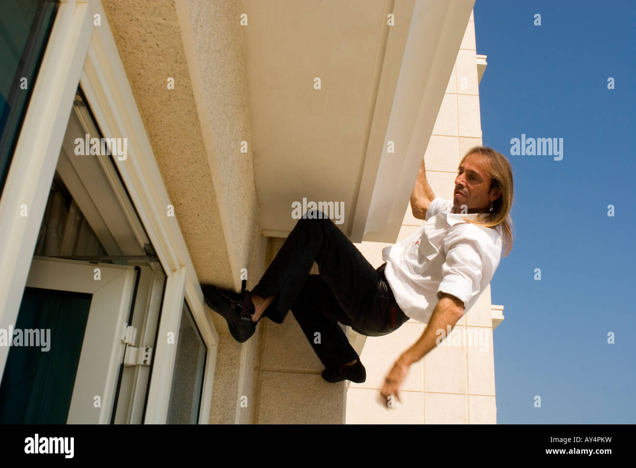 Alain Robert, Spiderman, French urban free solo climber Stock Photo