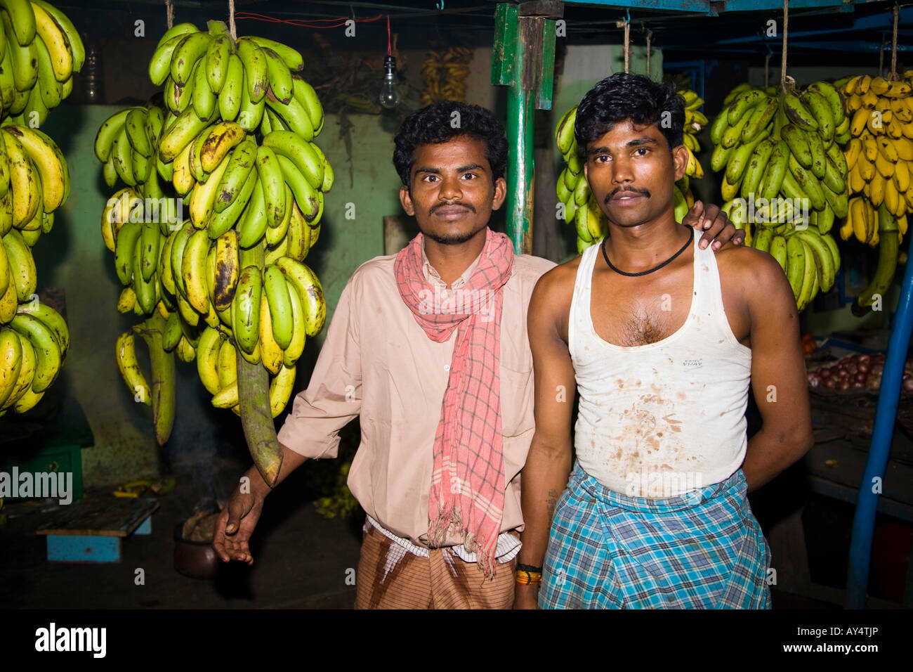 Two banana sellers in a street market, Madurai, Tamil Nadu, India Stock Photo
