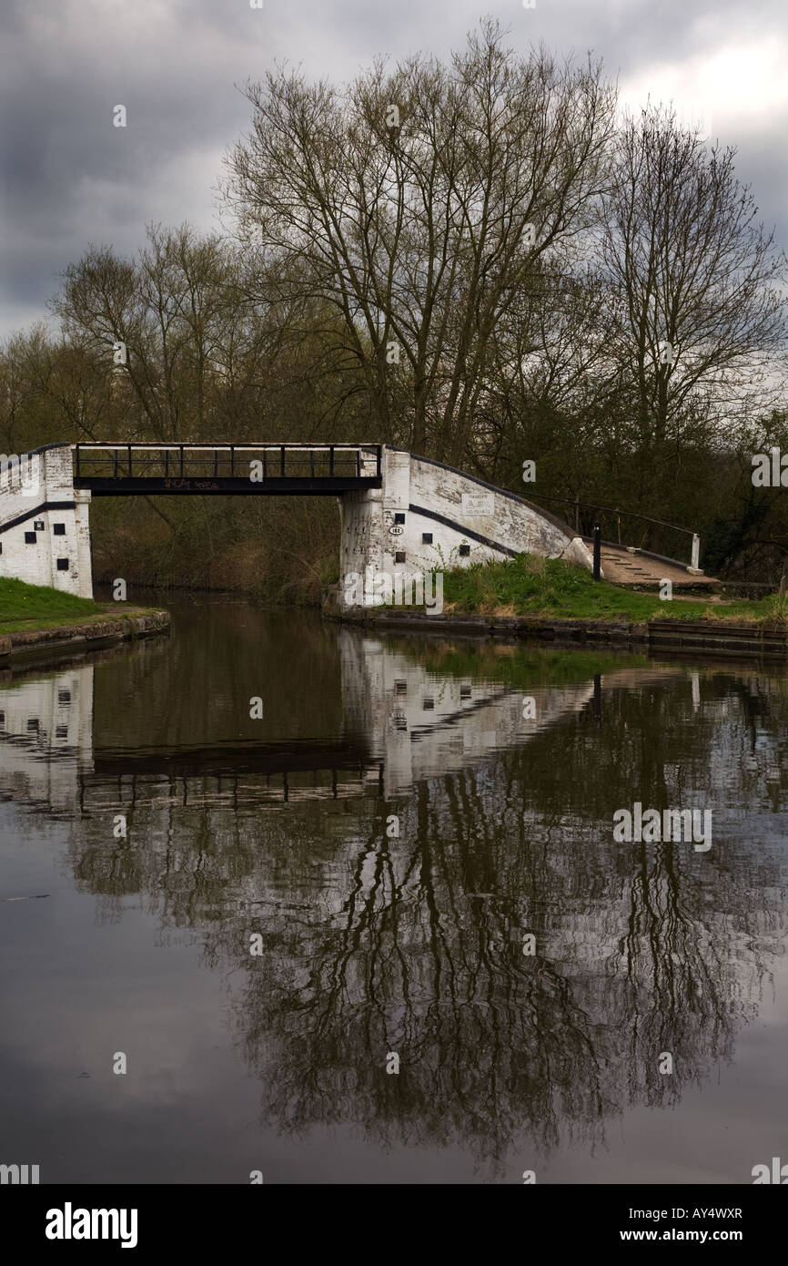 Canal bridge reflection at a crossing on the Grand Union Canal at Denham Stock Photo