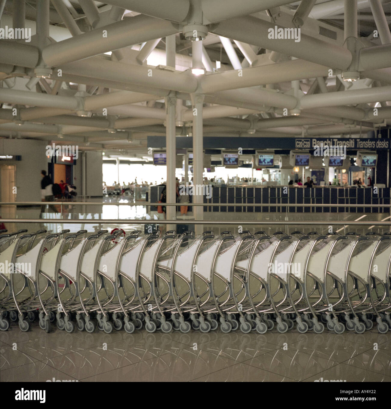 trolleys inside an international airport Stock Photo Alamy