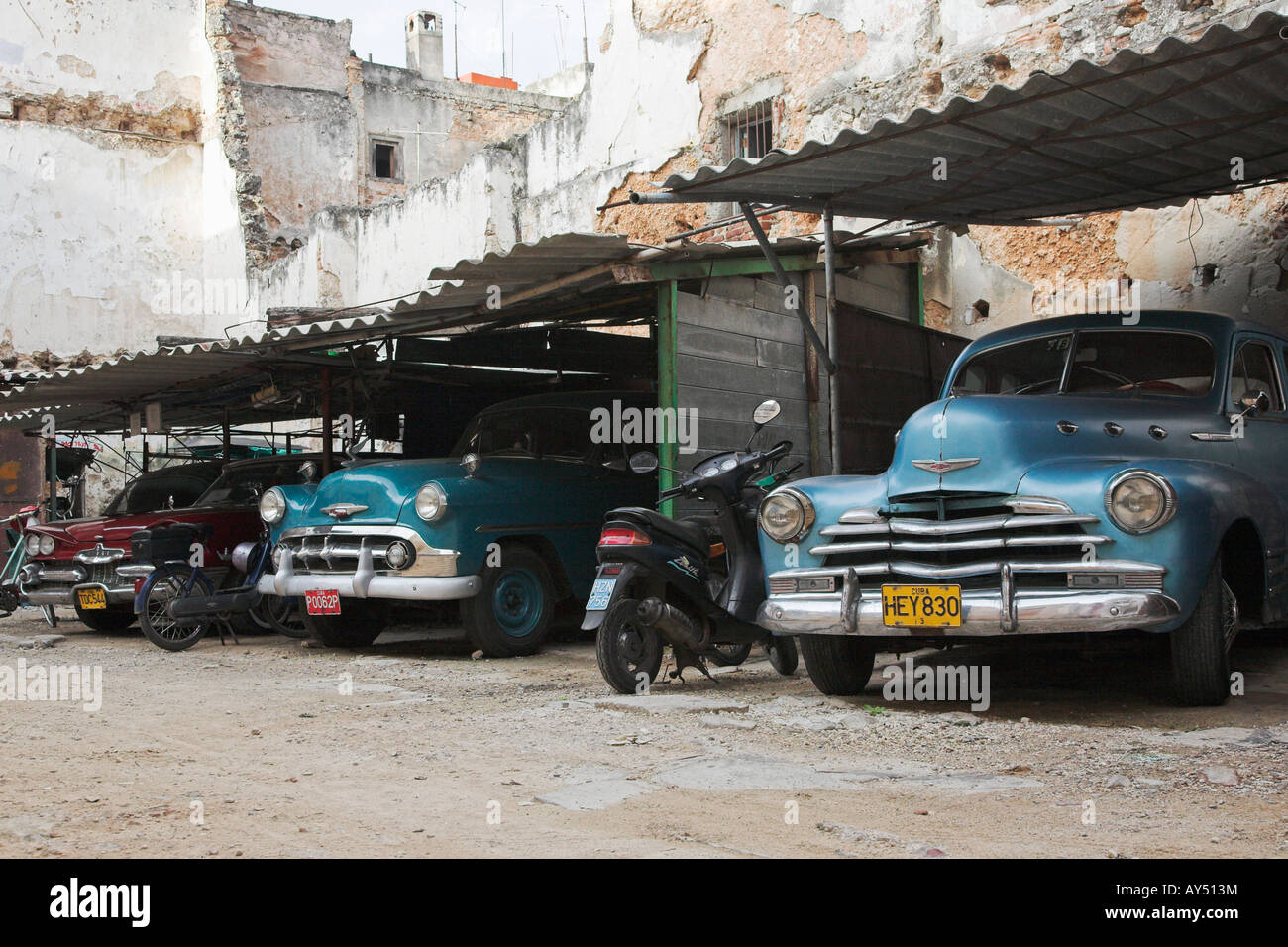 Cuban cars in garage Stock Photo