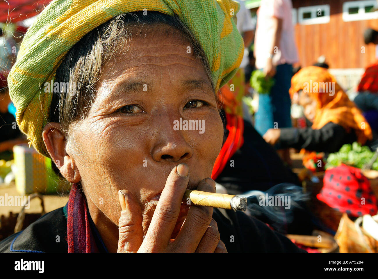 Mature woman smoking cheroot cigar hi-res stock photography and images ...