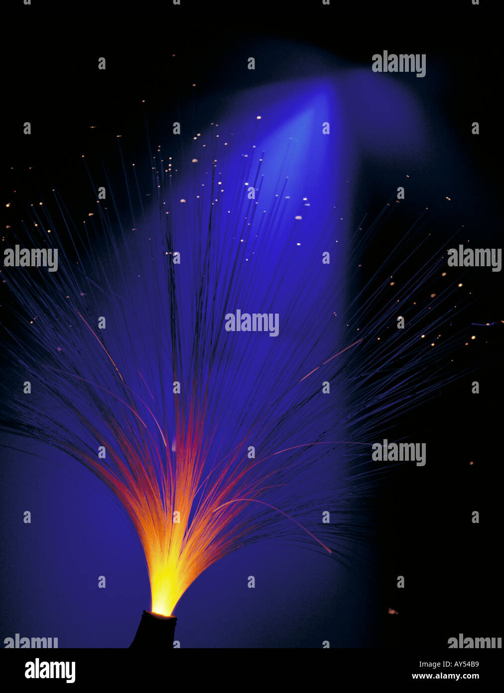 Detail of the end of a fibre optic cable lit up Stock Photo