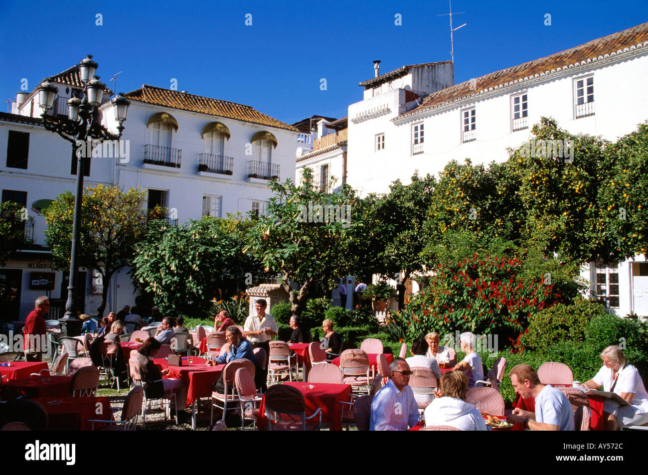 Out door cafes in Orange Square Marbella Plaza de Los Naranjos Malaga province Andalucia Spain Stock Photo