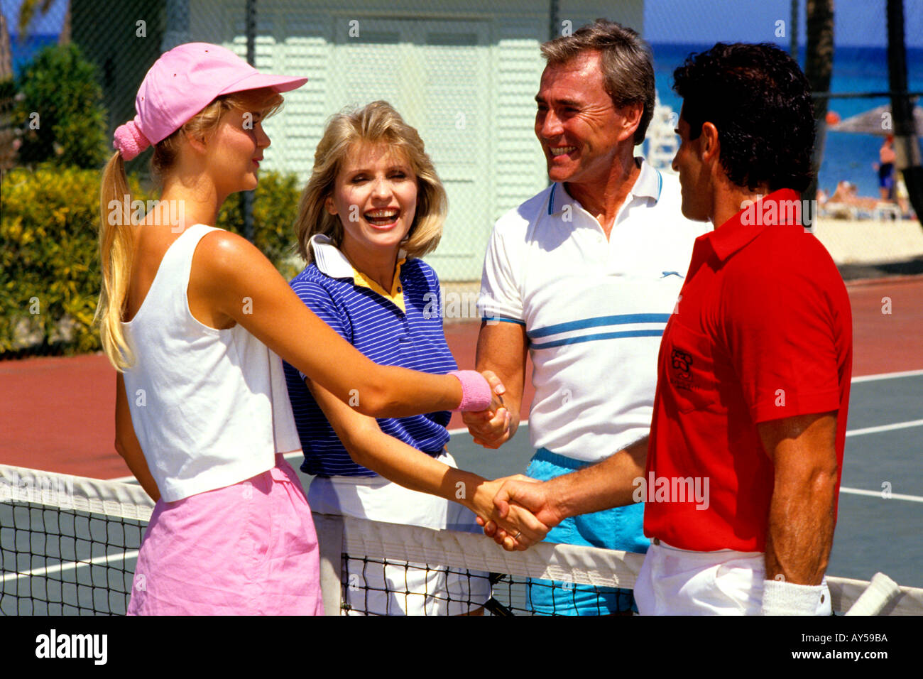 Couples Playing Tennis in the Caribbean Stock Photo Alamy