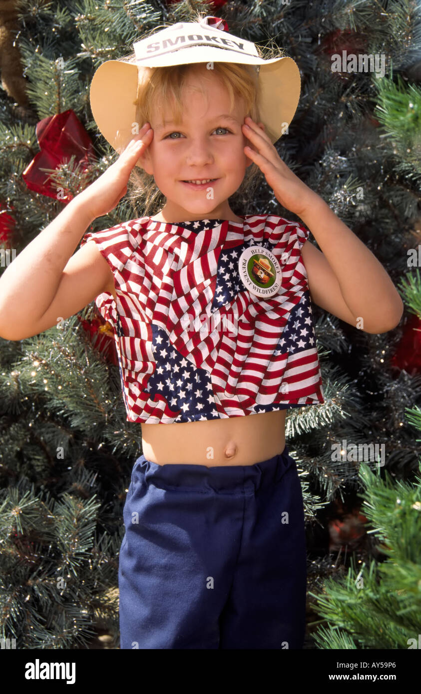 An excited young lady participates in the patriotic parade, at the annual 4th of July celebration in Capitan, New Mexico. Stock Photo