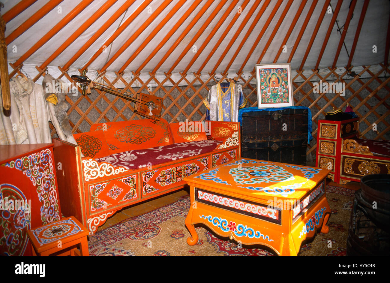 Fathers bed and musical instrument inside of museum Ger, Bogd Khan ul (Mt Bogdo National Park) near Ulan Bator, Mongolia Stock Photo