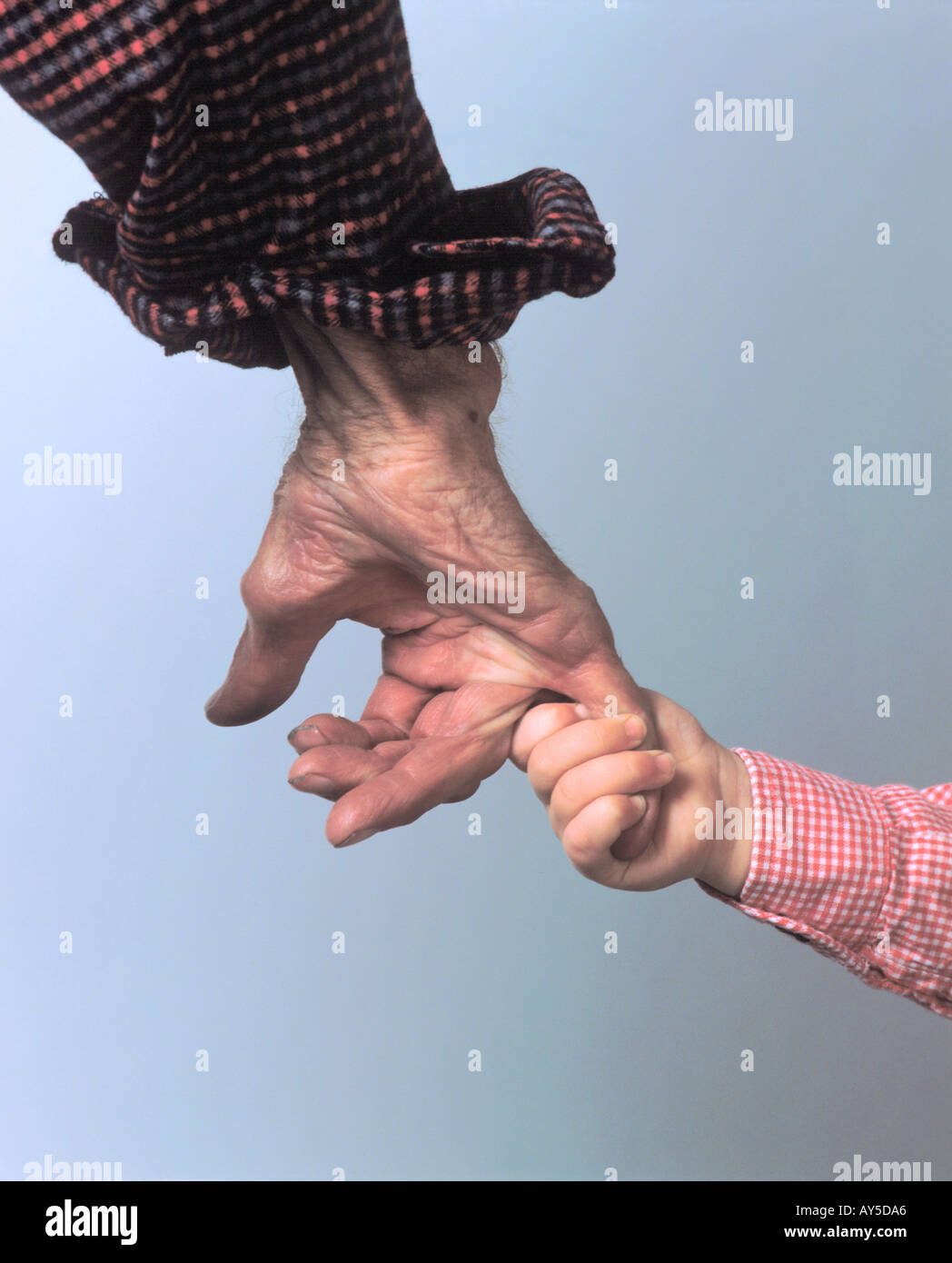 old man and young child holding hands Stock Photo - Alamy