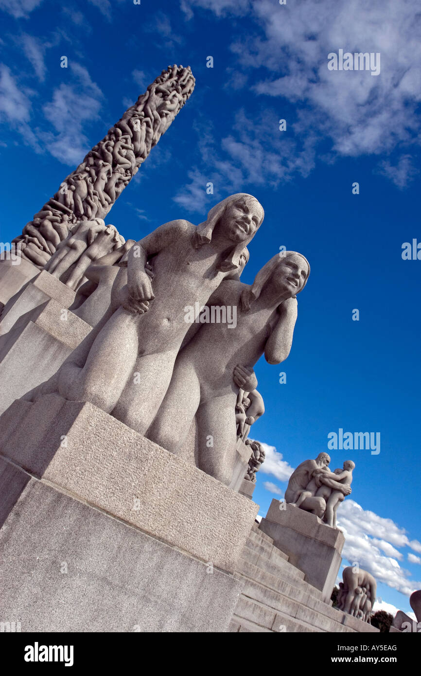 Statue of teen girls in front of the monolith in Vigeland Sculpture park, Frogner Park, Oslo, Norway Stock Photo