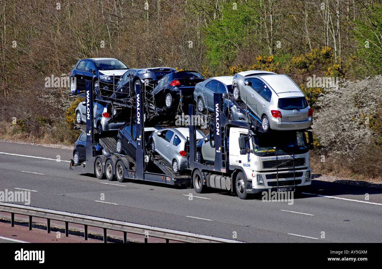 Walon car transporter carrying new Toyota cars on M40 motorway, Warwickshire, UK Stock Photo