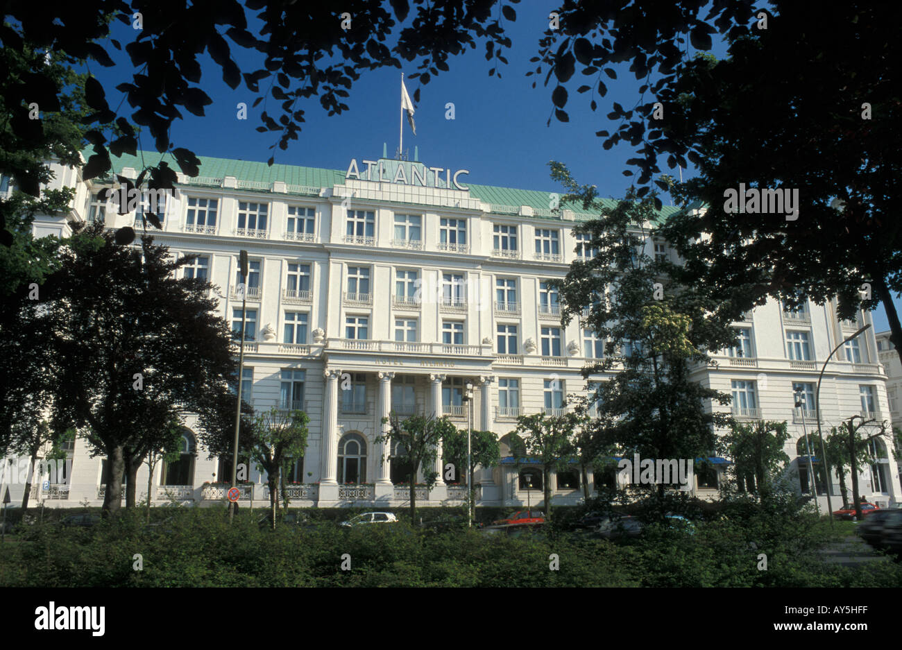 Luxury hotel Kempinski Atlantic and street 'An der Alster' at lake Aussenalster in Hamburg, Germany Stock Photo