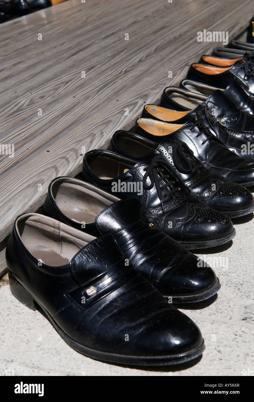 "Shoes of Japanese businessmen outside a Shinto shrine in Ise Japan ...