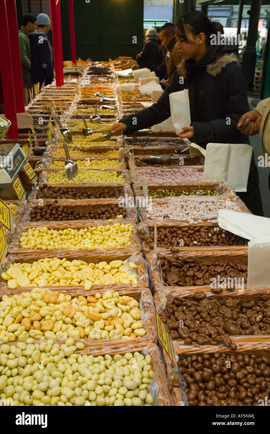 Nuts seeds and sweets stand at Borough Organic market in London UK