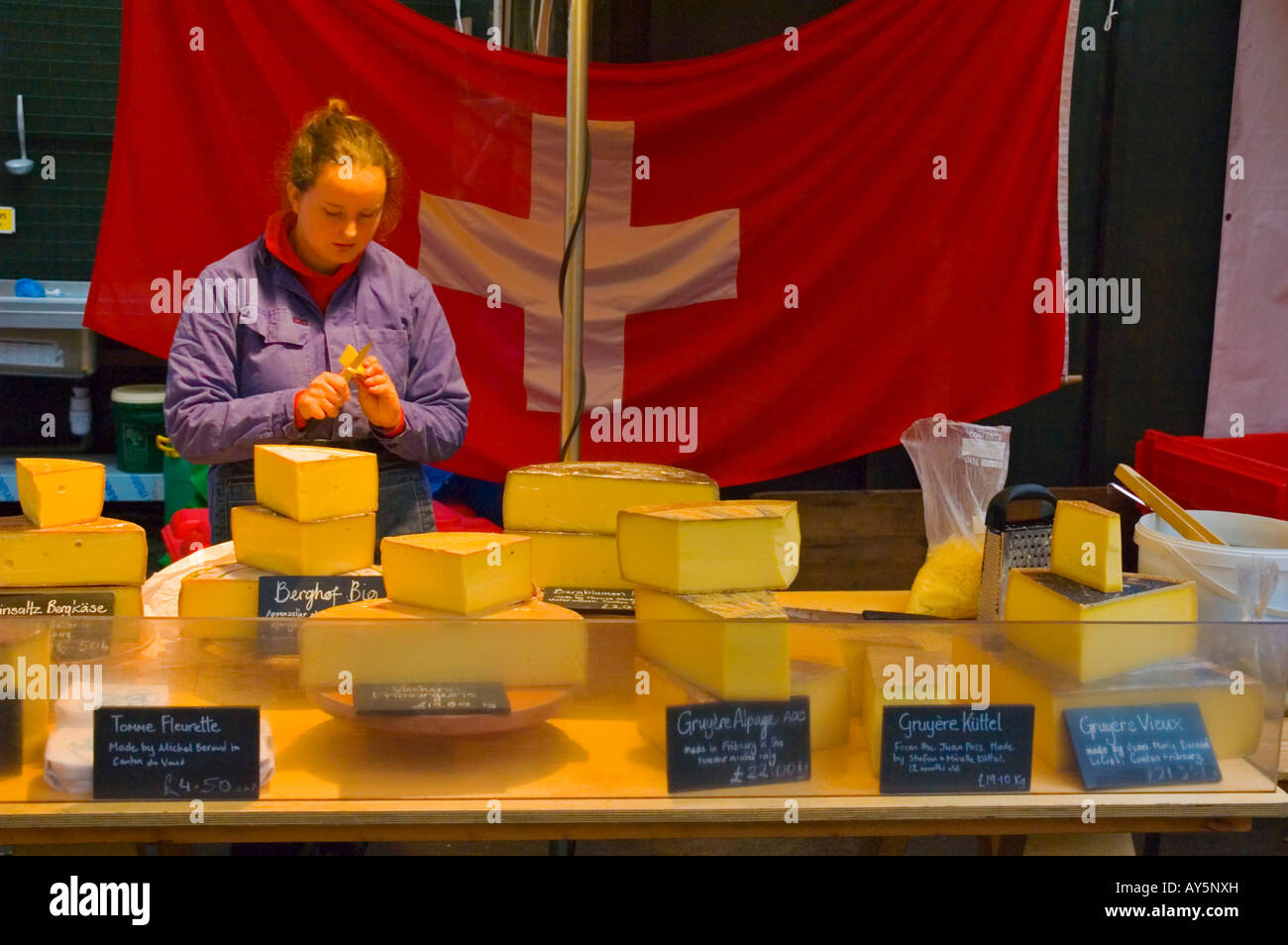 Swiss cheese at Borough Organic market in London UK Stock Photo