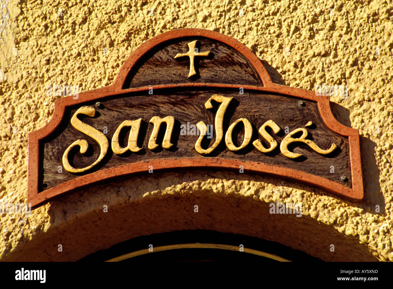 The handcarved sign of adobe San Jose church, in Anton Chico, New
