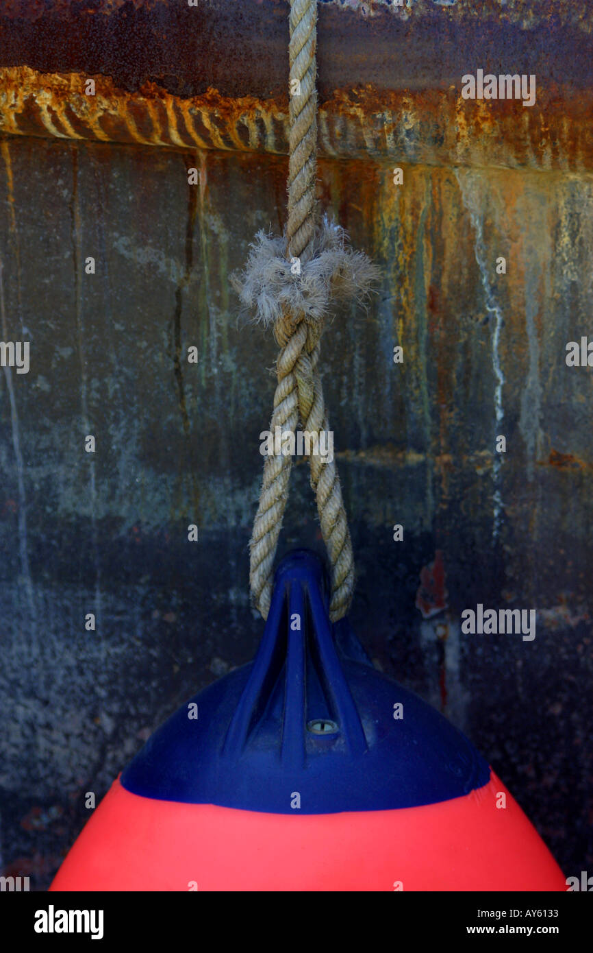 Fender or bumper on a fishing boat Stock Photo Alamy