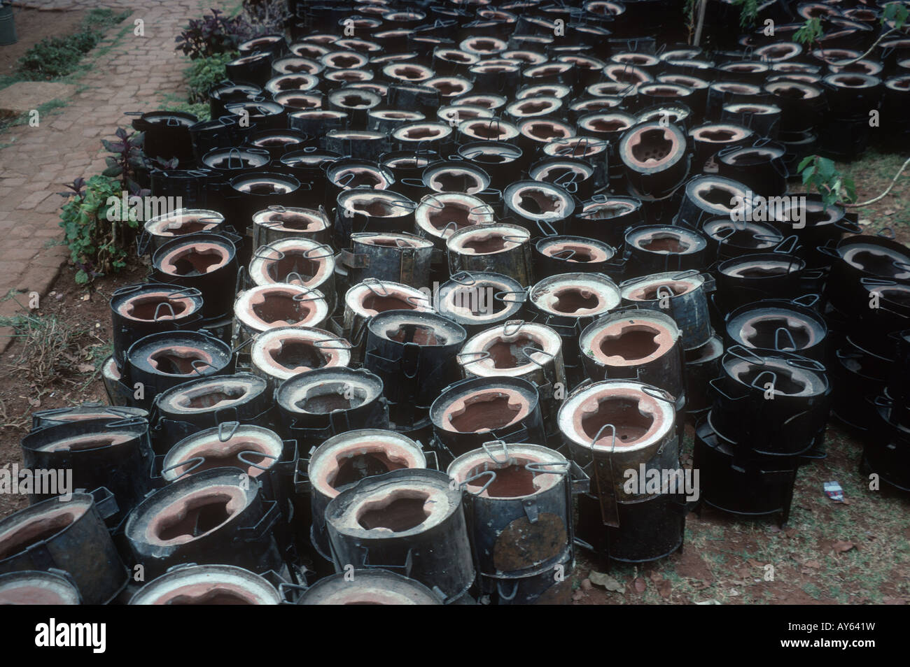 Charcoal cooking stoves in downtown market Nairobi Kenya Stock Photo