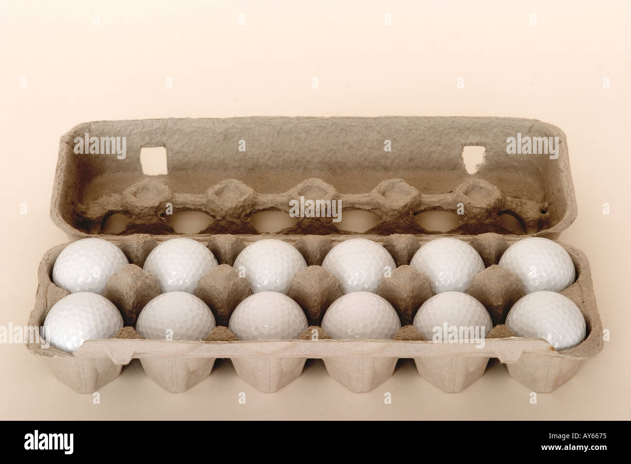 golf balls in egg carton Stock Photo Alamy