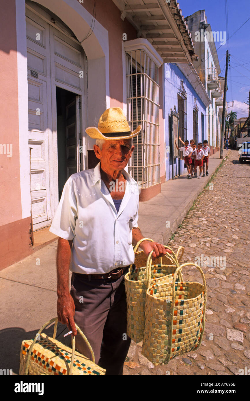 Colorful Man Selling Baskets in Old Colonial Village Trinidad Cuba