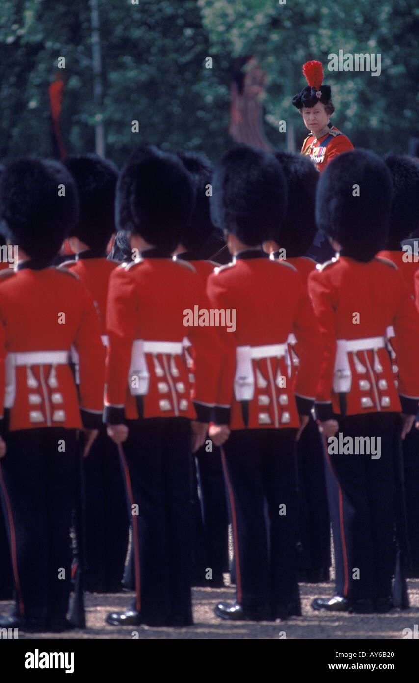 Trooping the Colour London England The Queen Elizabeth 11 inspects her troops  80s riding a horse. 1985 UK HOMER SYKES Stock Photo