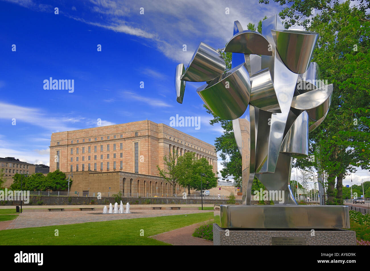 Sculpture with the Finland Parliament Building in Helsinki Stock Photo ...
