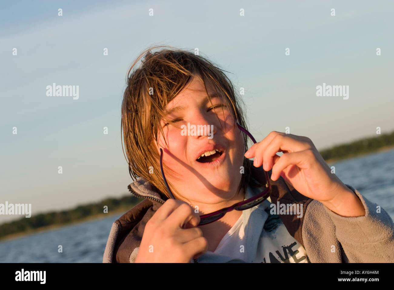 Blond teenager, Lake Lubans, Latvia Stock Photo