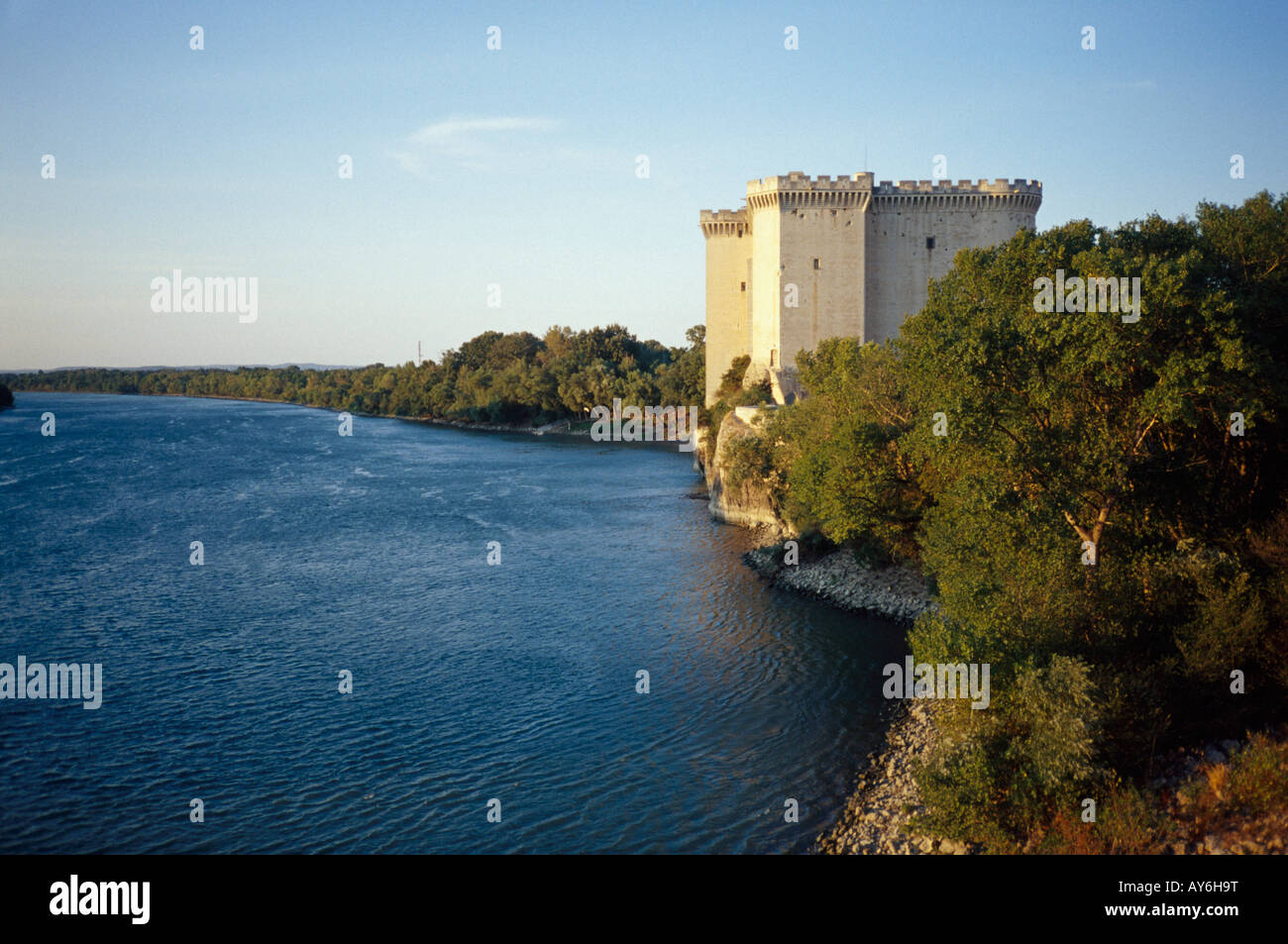 Castle in Tarascon, Bouches du Rhone, France in evening light next to the river Rhone Stock Photo
